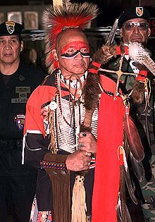An Abenaki in traditional clothing