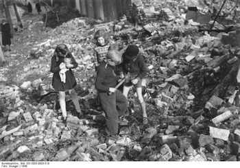 Berlin children in rubble.