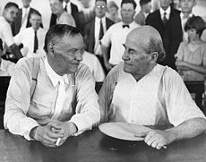 Clarence Darrow (left) and William Jennings Bryan chat in court during the Scopes Trial.
