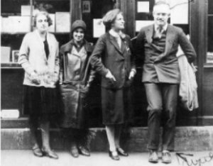 Sylvia Beach and Hemingway, with her assistants