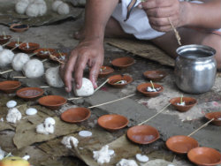 Small rice balls known as pindas are part of Hindu funeral ceremonies