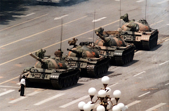 Man standing in front of tank at Tiananmen Square demonstration