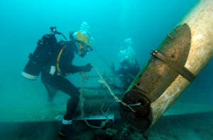 Divers working with underwater salvage