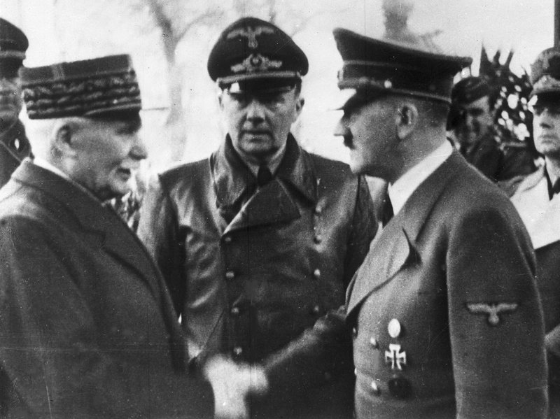 Hitler shaking hands with French leader Marhal Philippe Pétain in 1940