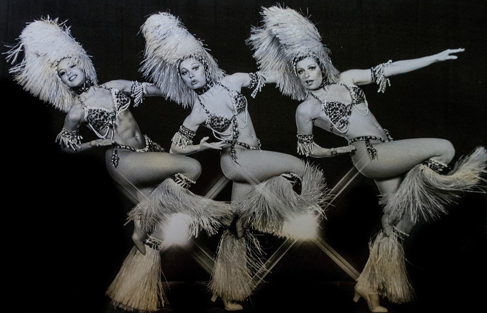 Women in showgirl costumes