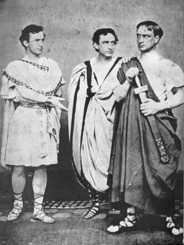 Black-and-white photo of John Wilkes Booth (left) with brothers Edwin and Junius Jr. performing Shakespeare's Julius Caesar in 1864