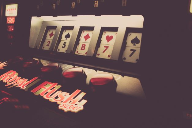 Slot machine in casino in dim lighting