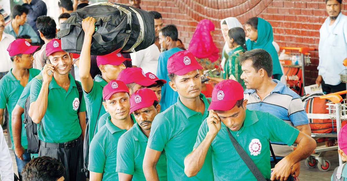 Bangladeshi migrant workers standing in line at Hazrat International Airport