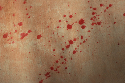 A bloodstain pattern on a wall