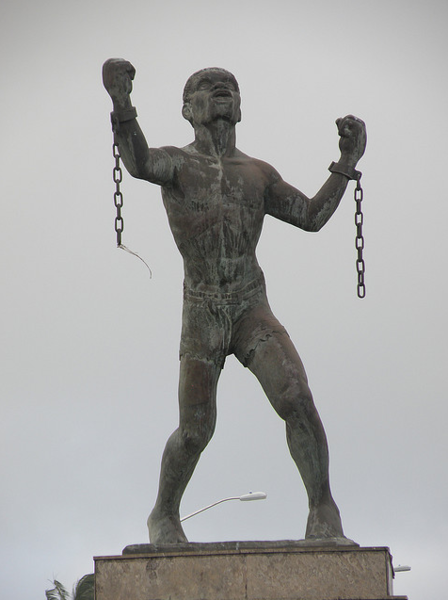 Photograph of Emancipation Statue in Barbados, showing figure with broken chains dangling from wrists