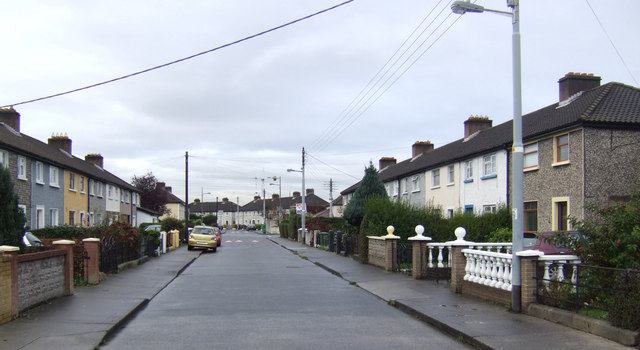 photo taken from the middle of the road of rowhouses on Brandon Road in Drimnagh with overcast sky