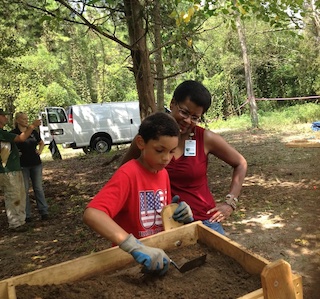 Tananarive Due and her son Jason during the excavation at the Dozier School in 2013
