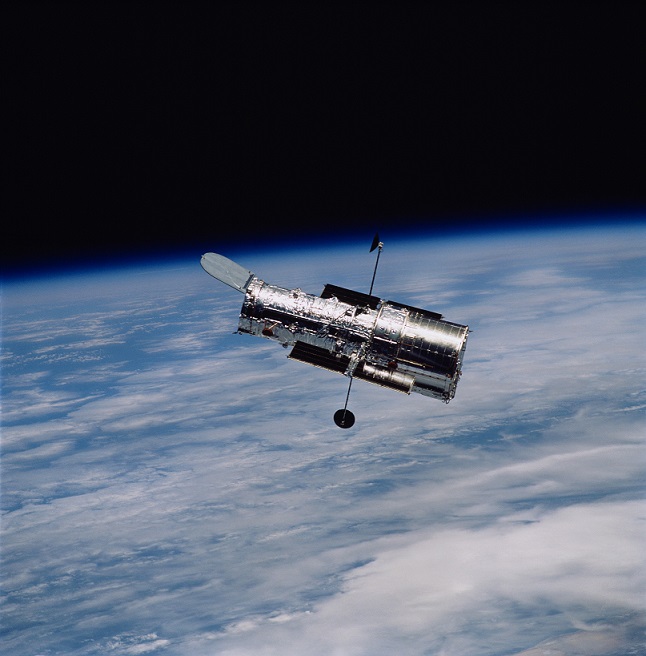 Hubble telescope floating in space