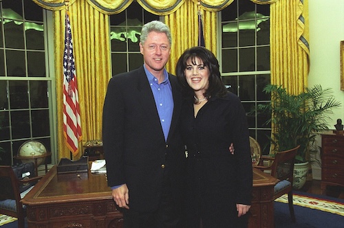 color photograph of President Bill Clinton standing next to Monica Lewinsky in the Oval Office of the White House