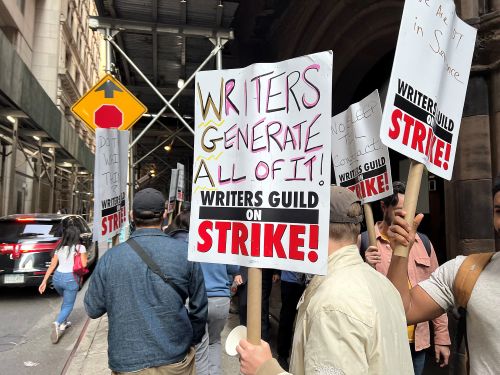 Photo of a picket line of writers
